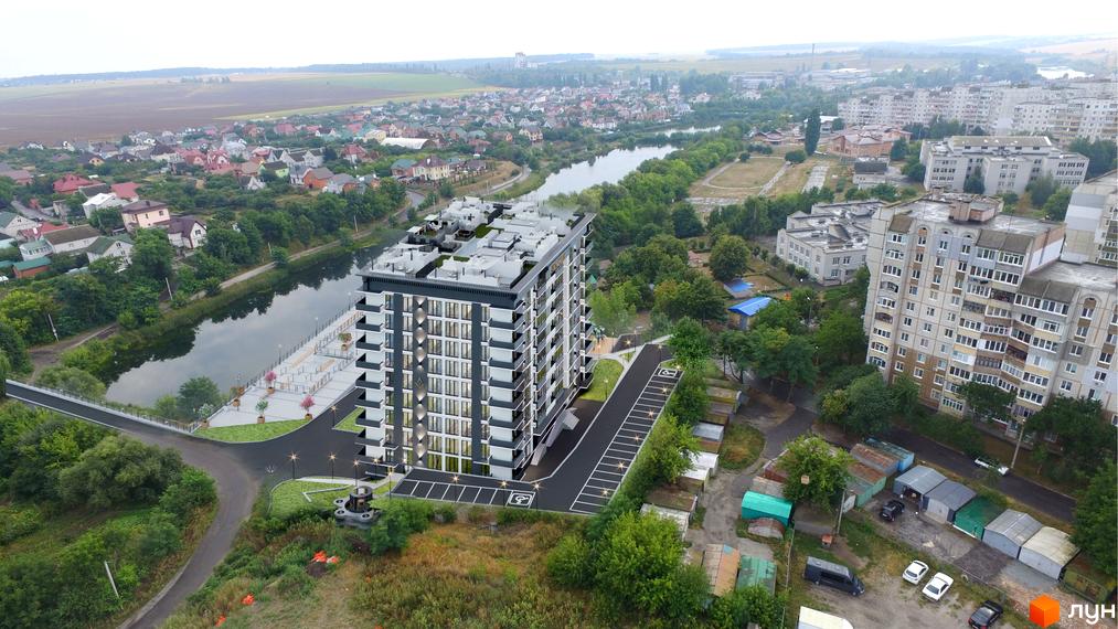 Зображення Житлового комплексу Горизонт з висоти пташиного польоту. Видно багатоповерховий будинок та прибудинкову територію.