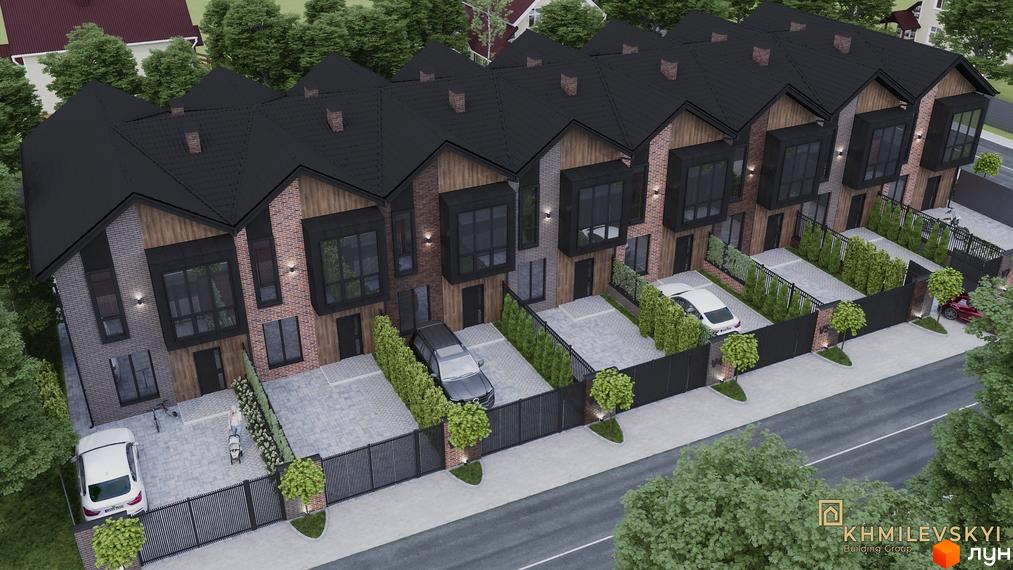 V8 townhouse - сучасний житловий комплекс з таунхаусами, що мають цегляний фасад та великі вікна. Прибудинкова територія облаштована парковками та зеленими насадженнями.