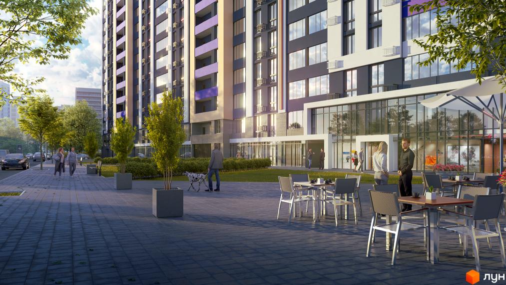 Житловий комплекс OK'LAND: багатоповерховий будинок з фасадом у сірих, білих та фіолетових кольорах. Прибудинкова територія з бруківкою, деревами та літнім кафе.