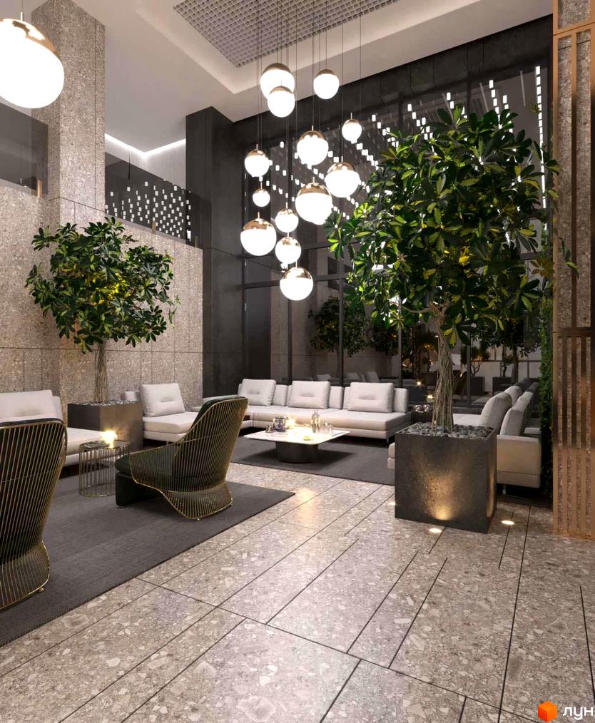 Інтер'єр лобі житлового комплексу High Hills з великими рослинами, диванами та дизайнерськими кріслами. Сучасний дизайн з великою кількістю світла та простору.