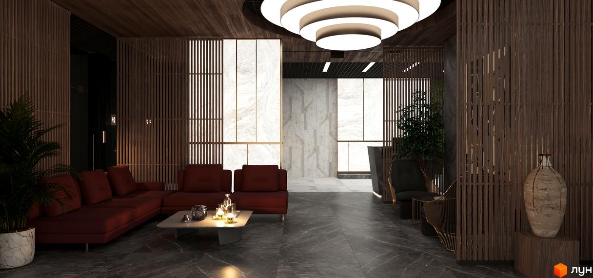 Інтер'єр лобі житлового комплексу High Hills з червоним диваном, мармуровими стінами та дерев'яними елементами.