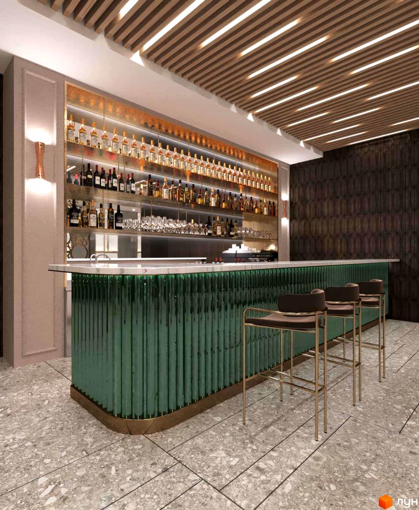 Інтер'єр бару з зеленим фасадом та полицями, заповненими пляшками алкоголю. Три барні стільці стоять біля стійки.