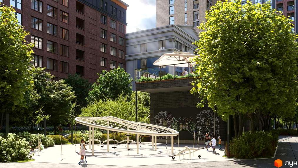 Житловий комплекс Stanford. Цегляні будинки з великими вікнами, поруч дитячий майданчик та зелені насадження. На території комплексу є тераса з парасолькою.