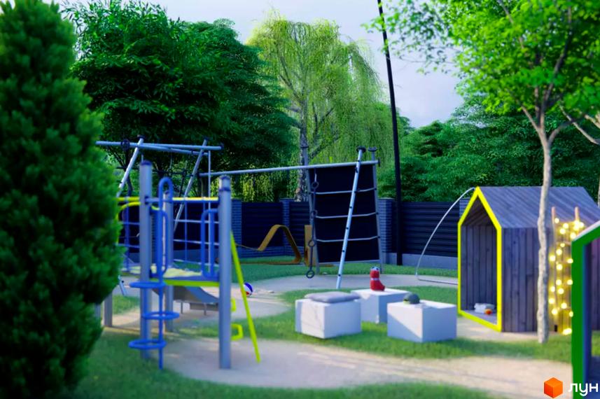 Дитячий майданчик біля таунхаусів Idilika Home. На території є гірка, гойдалка та будиночок для дітей.