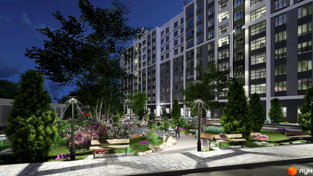 Зовнішній вигляд житлового комплексу Затишний з численними вікнами та прибудинковою територією з деревами та лавками.