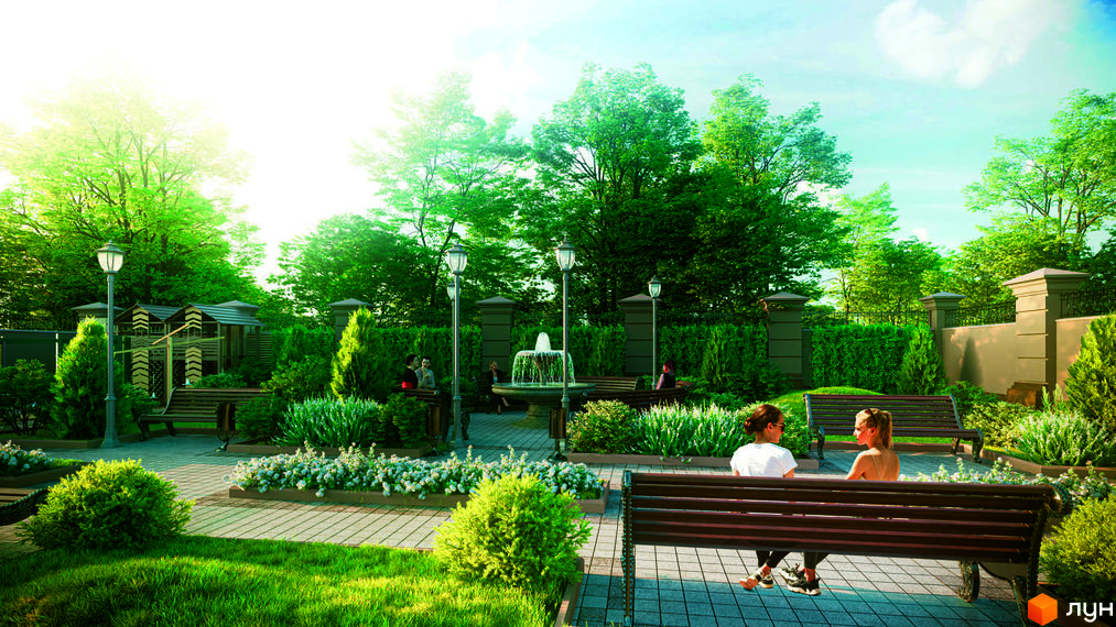 Прибудинкова територія житлового комплексу Французький бульвар, 29б з фонтаном, лавками та зеленими насадженнями.