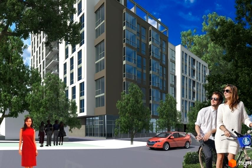 Новобудова Лейпцизька з фасадом з білих та темно-коричневих панелей, великими вікнами та балконами. Навколо зелені дерева та люди на велосипедах.