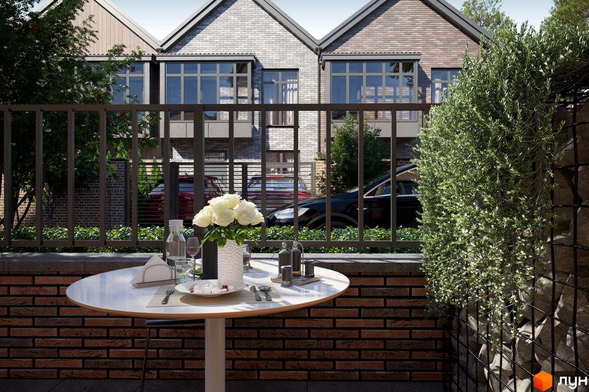 Котеджне містечко КМ SIB Home: фасади будинків з цегли та дерева, вікна, що виходять на приватний двір з зоною відпочинку.