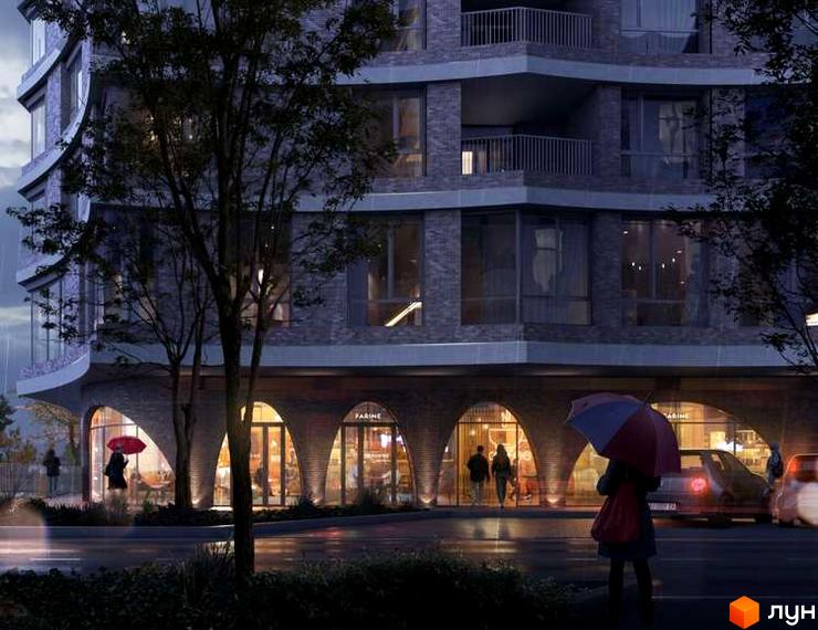 Житловий район Rybalsky: сучасна архітектура з виразними арками та панорамними вікнами. Навколо будинку облаштована прибудинкова територія з деревами та освітленням.