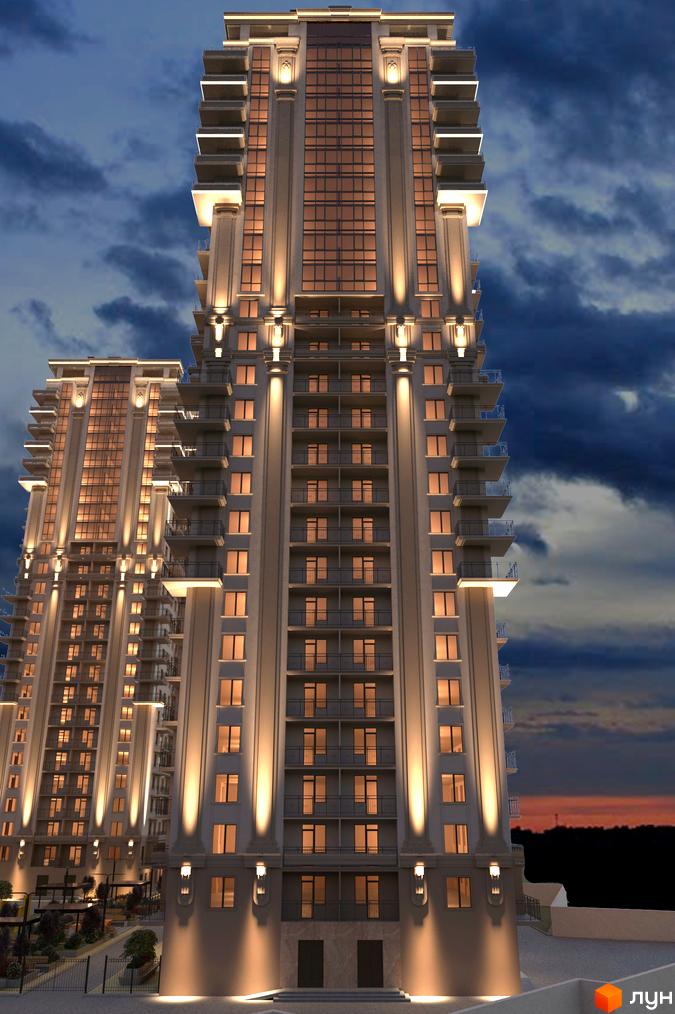Зображення фасаду Житлового комплексу Acropol. Багатоповерхова будівля з великими вікнами та балконами, освітлена у вечірній час.