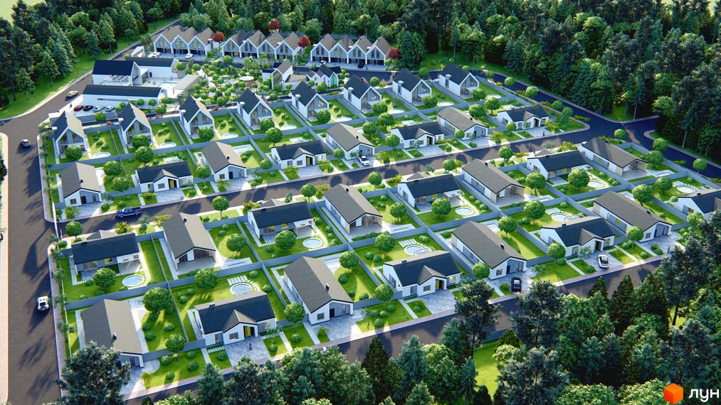 Котеджне містечко Chaletville з висоти, де видно будинки з білими фасадами та темними дахами, оточені зеленими газонами та деревами.