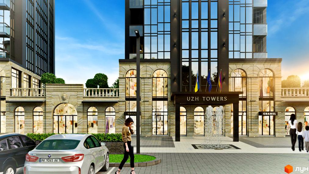 Фасад будинку Uzh Towers з вивісками Gucci та Chanel. На передньому плані припарковані автомобілі та пішоходи.
