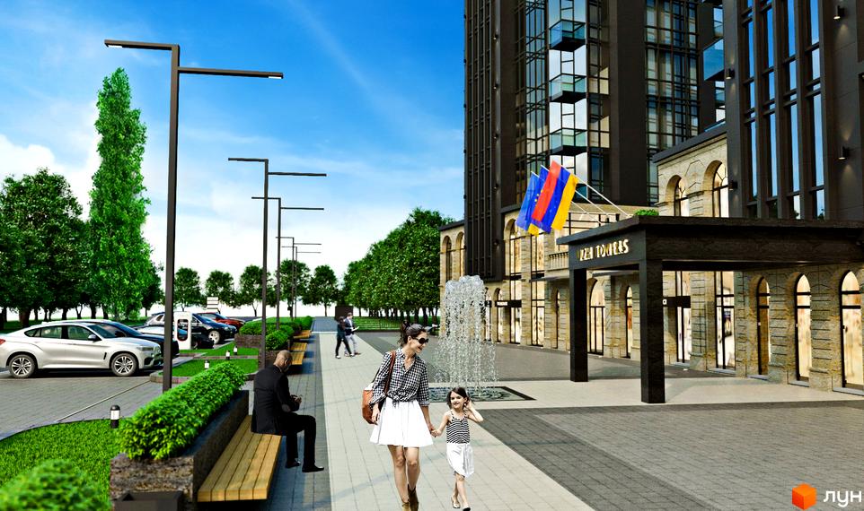 Житловий комплекс Uzh Towers: багатоповерховий будинок з темним фасадом, великими вікнами та облаштованою прибудинковою територією з фонтаном, лавками та парковкою.