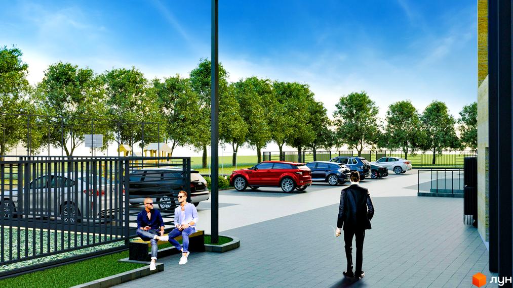 Фасад Житлового комплексу Uzh Towers з темними та світлими панелями. Поруч розташована простора парковка, зелені дерева та дитячий майданчик.