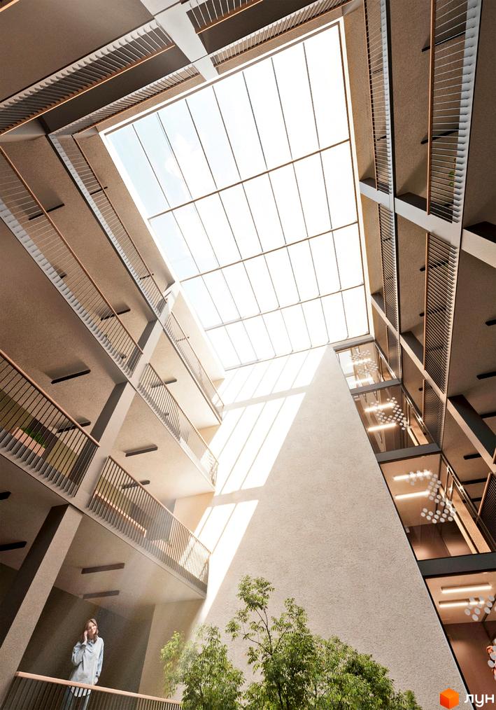 Житловий комплекс Art House з великим скляним дахом та балконами. Архітектура будівлі з використанням світлих тонів та зелені.