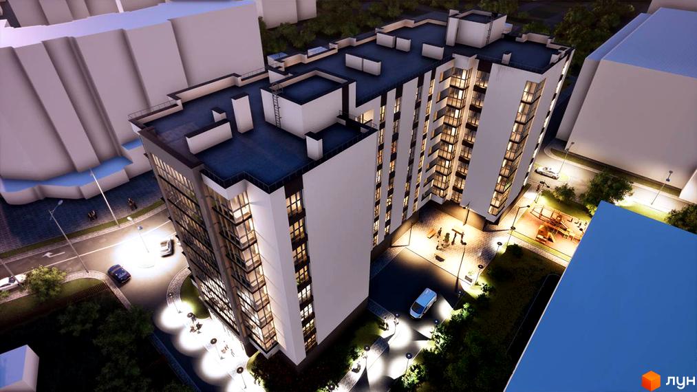 Зовнішній вигляд житлового комплексу Елітний з освітленою прибудинковою територією та дитячим майданчиком. Фото новобудови з висоти пташиного польоту.