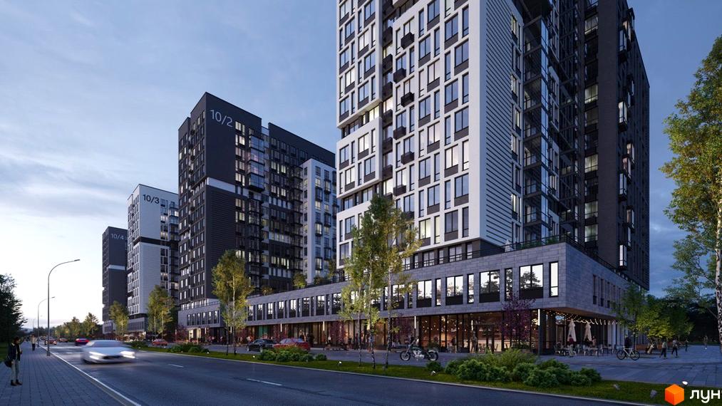 Сучасний житловий комплекс Vyshgorod Sky з високими будівлями та комерційними приміщеннями на першому поверсі. Поруч дорога з автомобілями та пішохідна зона з деревами.