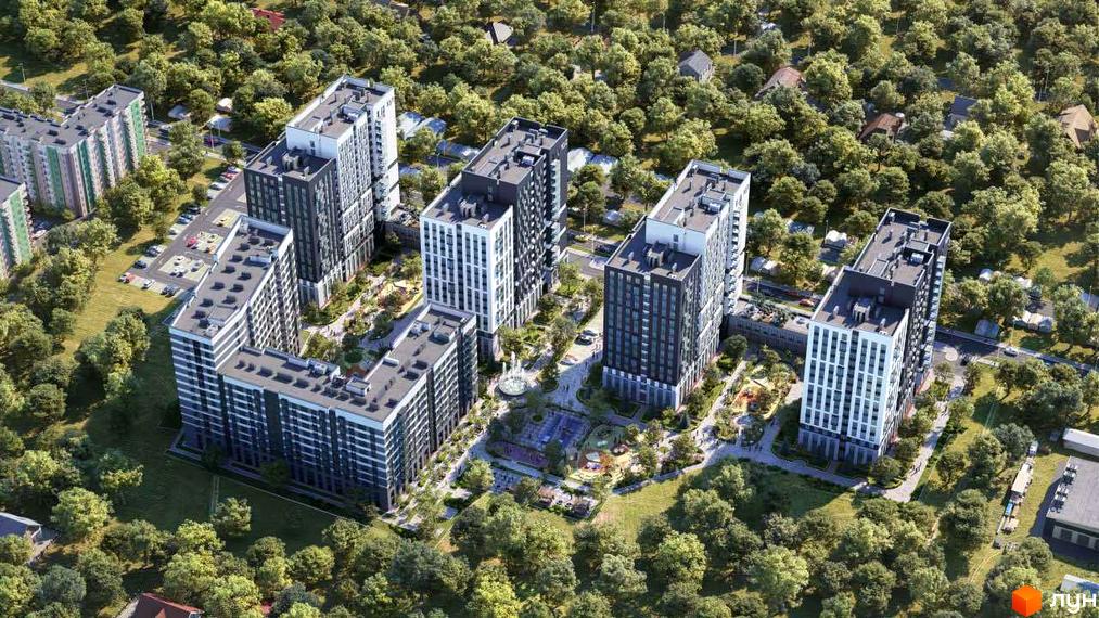 Вид на житловий комплекс Vyshgorod Sky з висоти пташиного польоту, що демонструє сучасну архітектуру будівель та зелену прибудинкову територію з дитячими майданчиками та зонами відпочинку.