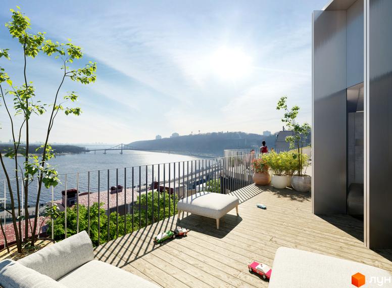 Фрагмент будівлі ANDRIYIVSKY City Space з світлими панелями та простора тераса з дерев'яною підлогою, що виходить на річку з мостом.