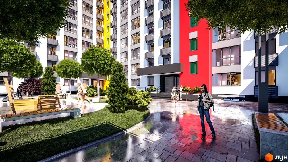 Житловий комплекс BARVY: фасади будівель з яскравими кольорами та доглянута прибудинкова територія з деревами та місцями для відпочинку.