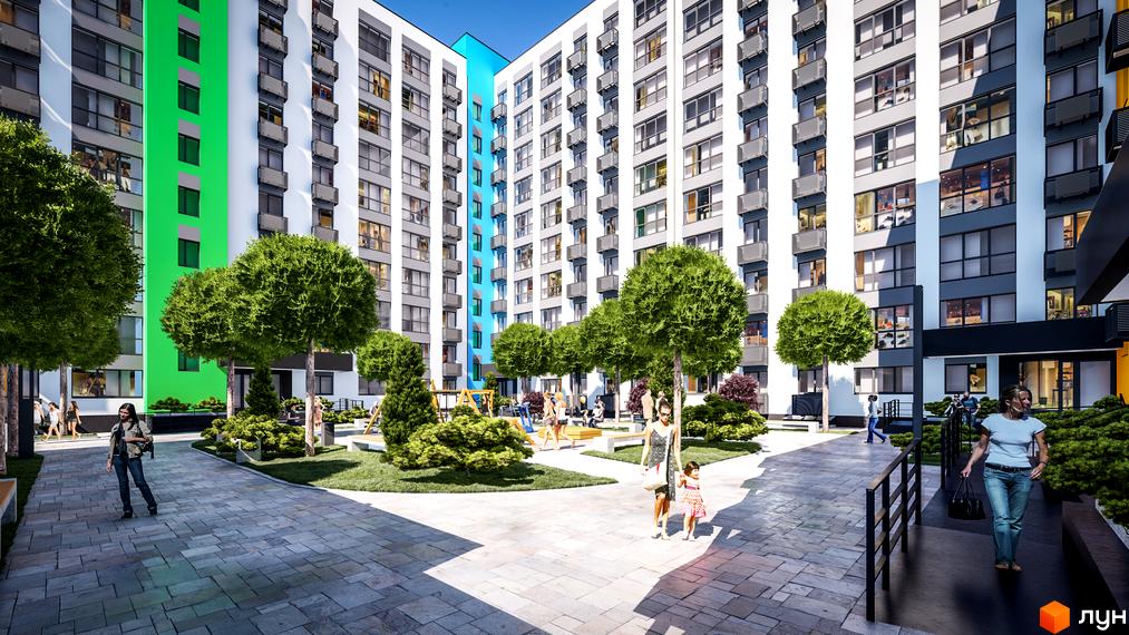 Житловий комплекс BARVY з яскравими фасадами та зеленими насадженнями. Простора прибудинкова територія з зонами відпочинку для мешканців.