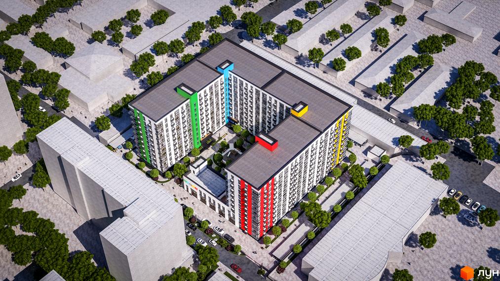 Житловий комплекс ЖК BARVY - це багатоповерховий будинок з яскравими кольоровими вставками на фасаді та доглянутою прибудинковою територією з деревами.