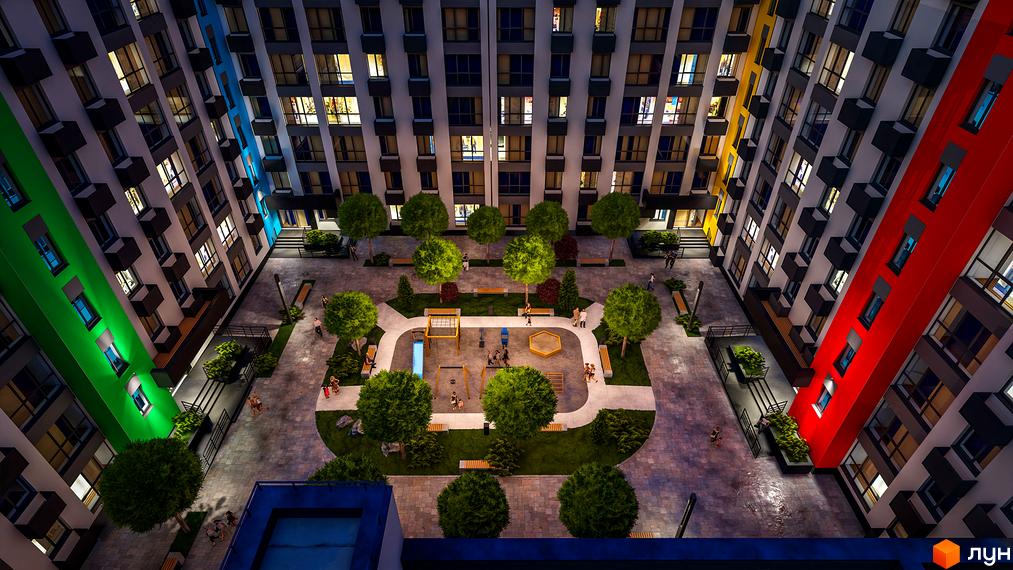 Житловий комплекс BARVY: яскравий фасад будинку та затишний внутрішній двір з дитячим майданчиком та зонами відпочинку.