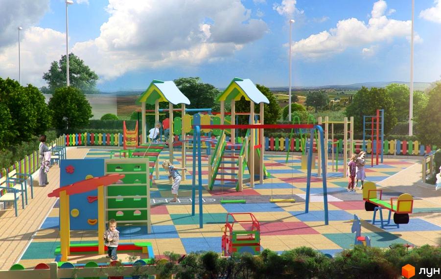 Дитячий майданчик житлового комплексу Welcome Home на Ревуцького з різнокольоровим покриттям та ігровими спорудами. Навколо зелені насадження та паркан.