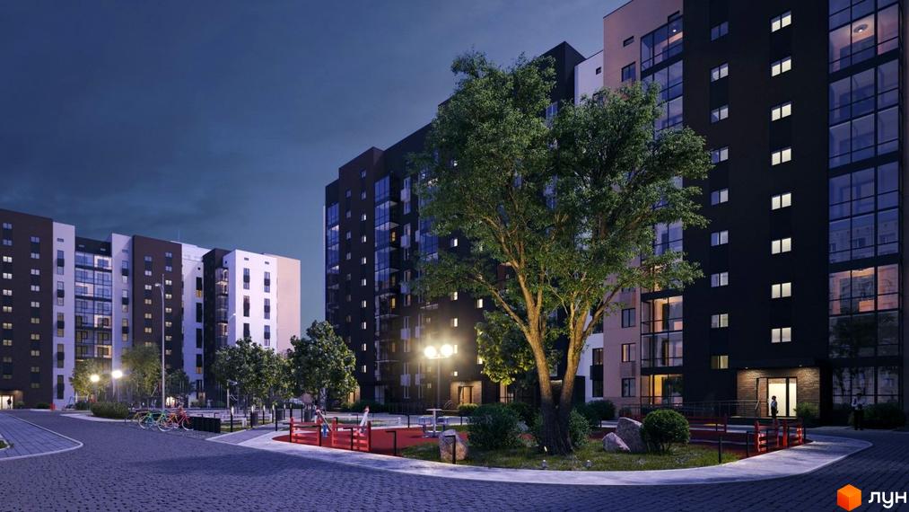 Житловий комплекс Мирний: багатоповерхові будинки темних та світлих відтінків з освітленими вікнами. Облаштована прибудинкова територія з деревами та дитячим майданчиком.