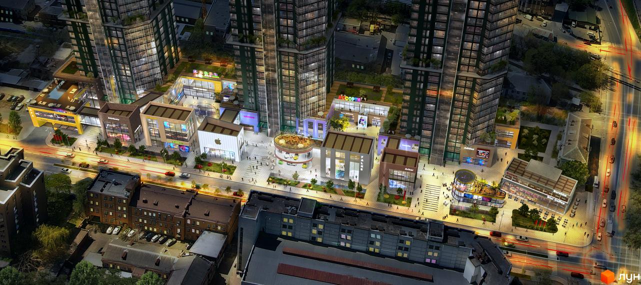 Комплекс The Resort з магазинами та громадськими просторами, оточений багатоповерховими будинками та міською вулицею з автомобілями.