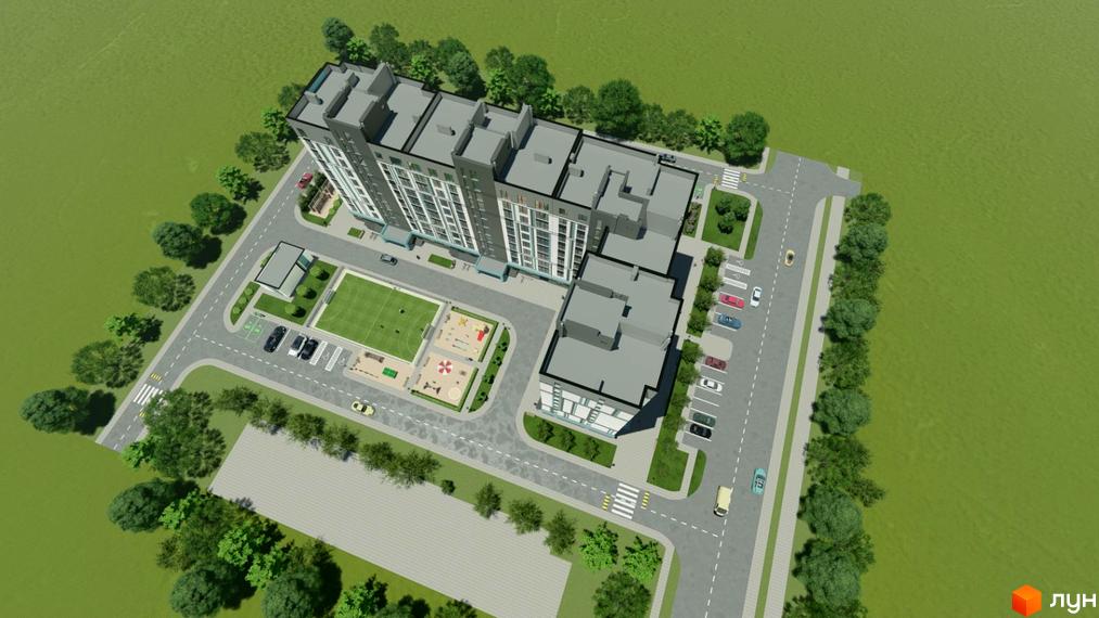 Вид згори на житловий комплекс Нова Барселона з багатоповерховими будинками, дитячим майданчиком та парковкою. Територія комплексу оточена деревами.