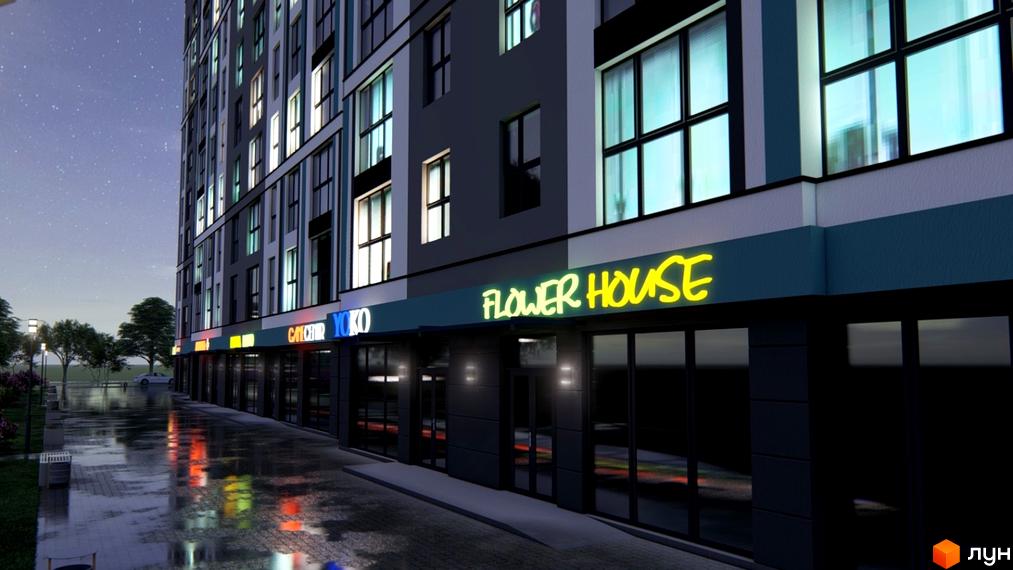 Житловий комплекс Нова Барселона. Зовнішній вигляд будинку з неоновими вивісками 