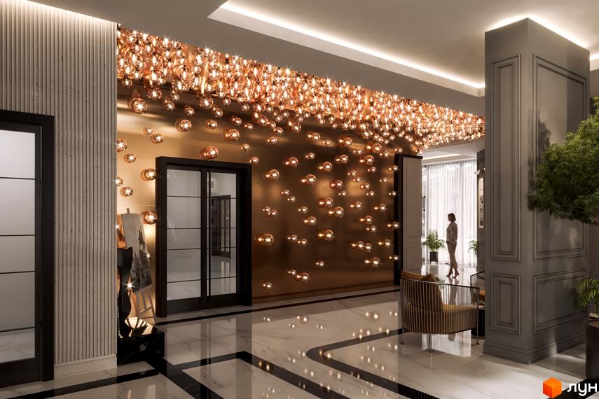 Інтер'єр холу Будівельного проєкту Krauss Gallery з оригінальним освітленням. Мармурова підлога з чорними вставками, світлі стіни та стильні меблі.