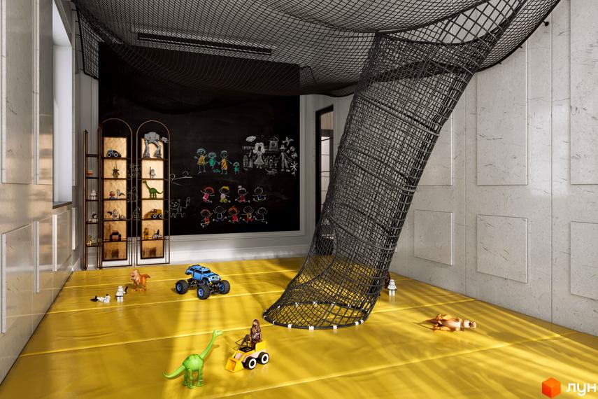 Інтер'єр ігрової кімнати в Будівельному проєкті Krauss Gallery. Дитяча кімната з іграшками та сіткою для лазіння.