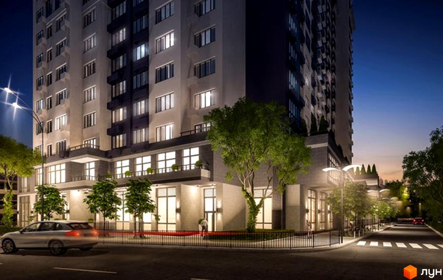 Житловий комплекс Victory V. Фасад багатоповерхового будинку з великою кількістю вікон та балконів, освітлений вночі. Поруч дорога з автомобілем та дерева.