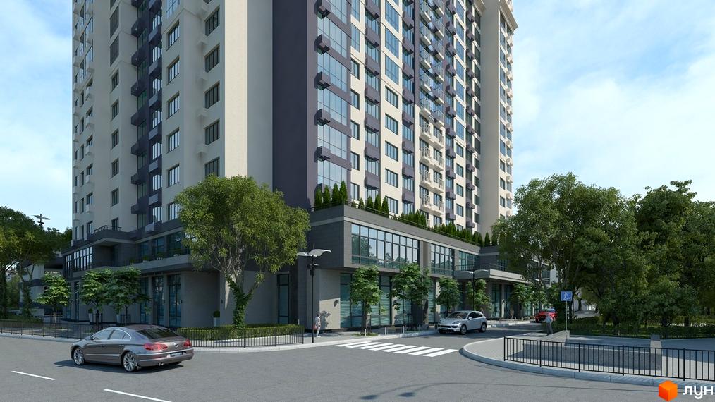 Житловий комплекс Victory V – висотна будівля з панорамними вікнами та балконами, оточена зеленими деревами. Навколо комплексу розташовані дороги та тротуари.