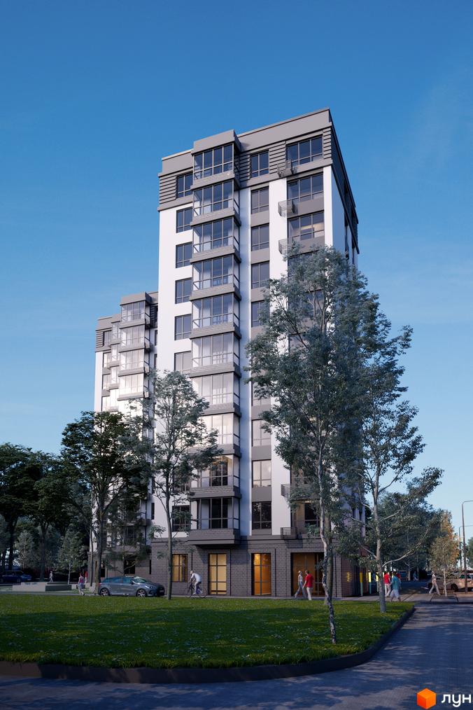 Зовнішній вигляд новобудови ЖК Сімейний з великими вікнами та сірою обробкою. Навколо будинку розташовані дерева та зелена галявина.