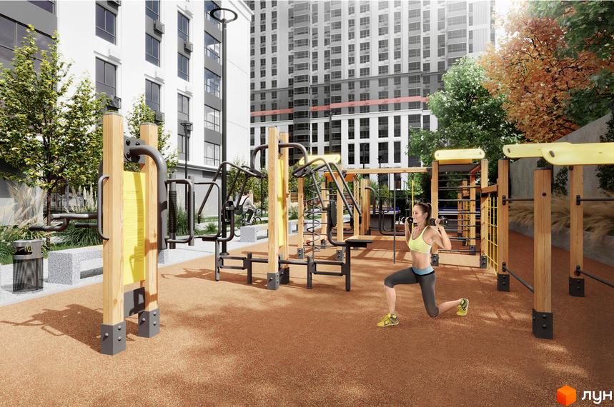 Житловий комплекс Mandarin ART з зоною для тренувань на відкритому повітрі. На території комплексу розташовані сучасні тренажери та зелені насадження.