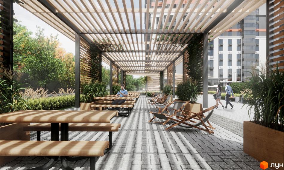 Житловий комплекс Mandarin ART. Зона відпочинку з дерев'яними лавками та шезлонгами під перголою, що прилягає до багатоповерхових будинків.