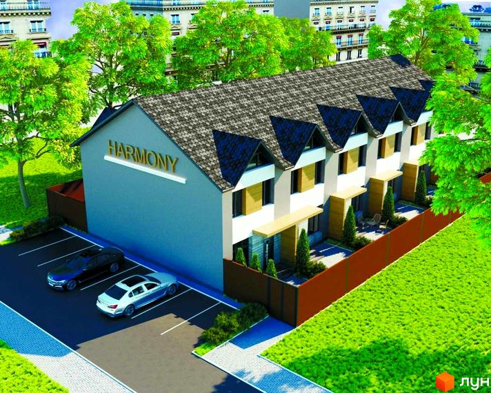 Таунхаус Гармонія-5 з сірим фасадом та темним дахом, з парковкою та зеленим газоном. Зовнішній вигляд новобудови.