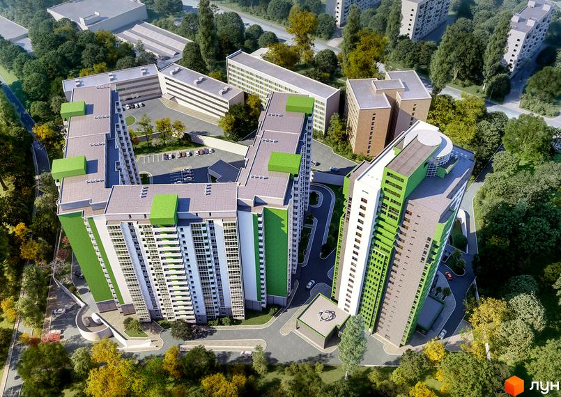 Житловий комплекс Герцен Парк з висоти пташиного польоту. Сучасна архітектура з зеленими елементами, багатоповерхові будинки та доглянута прибудинкова територія з деревами.