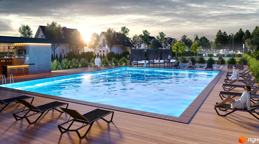 Будинки Котеджного містечка River Park мають світлі фасади та темні дахи. На території розташований великий басейн з дерев'яною терасою, зоною відпочинку та баром.