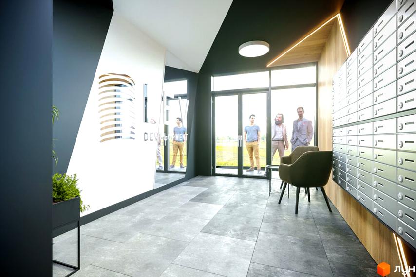 Сучасний вхід в житловий комплекс OBRIY3 з поштовими скриньками та зоною очікування. Навколо зелена територія.