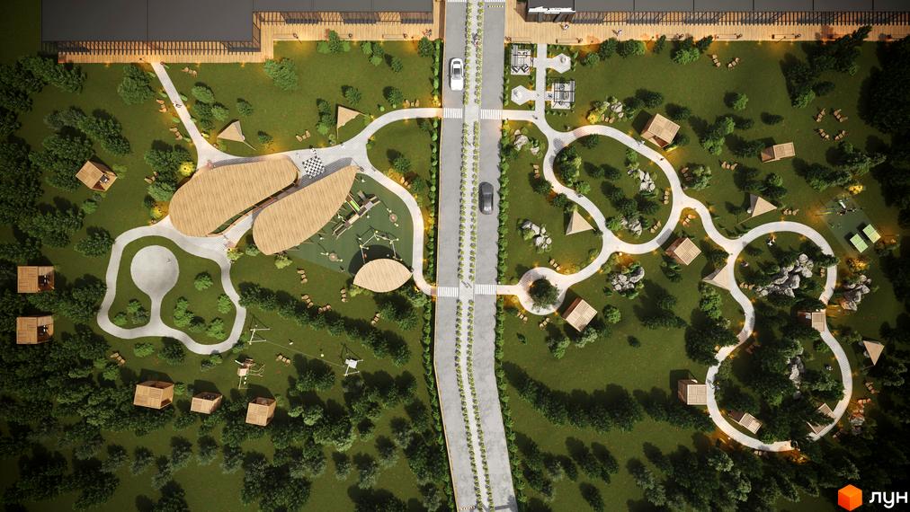 Котеджне містечко Затишний. Аерофотозйомка території з будиночками, дитячим майданчиком та пішохідними доріжками.