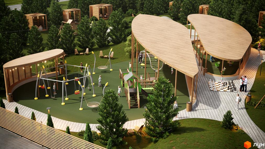 Котеджне містечко КМ Затишний: дитячий майданчик з гойдалками, гірками та зонами відпочинку під дерев'яними навісами. Територія комплексу озеленена деревами та має пішохідні доріжки.