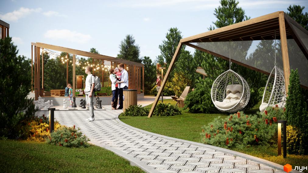 Котеджне містечко Затишний: зона відпочинку з великою шахівницею, підвісними кріслами та альтанками. Зелена територія з доріжками та освітленням.