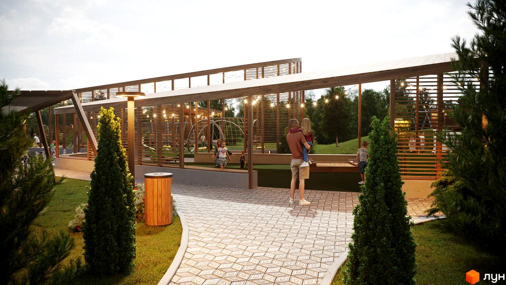 Котеджне містечко Затишний: дитячий майданчик під навісом з освітленням та зона відпочинку з лавками. Навколо зелена зона з деревами та доріжками.
