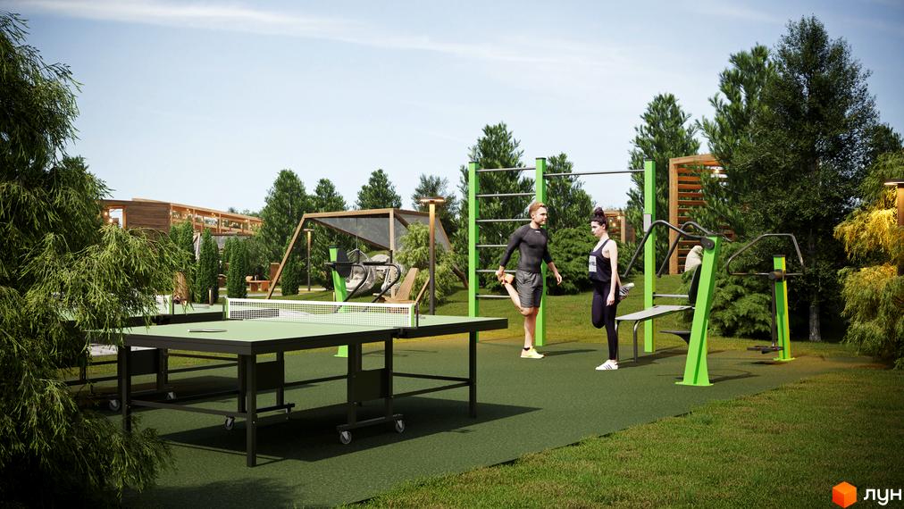 Котеджне містечко Затишний з дерев'яними елементами архітектури та облаштованою прибудинковою територією зі спортивним майданчиком і тенісним столом.