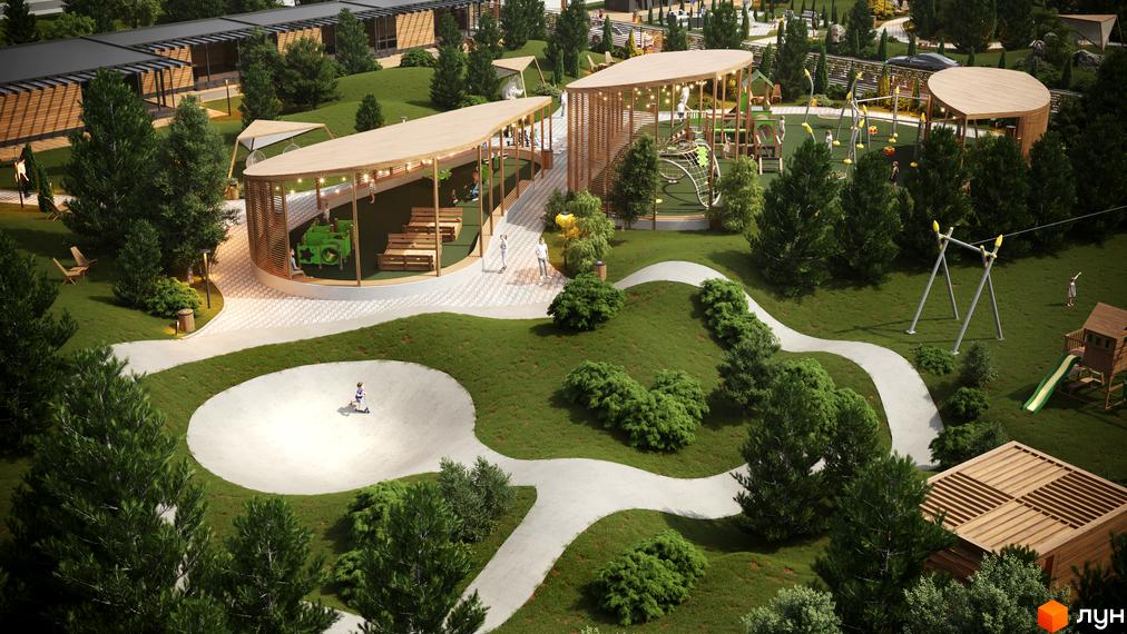 Котеджне містечко Затишний: дитячий майданчик з гірками, гойдалками та скейт-парком, зелена зона з доріжками та місцями для відпочинку.