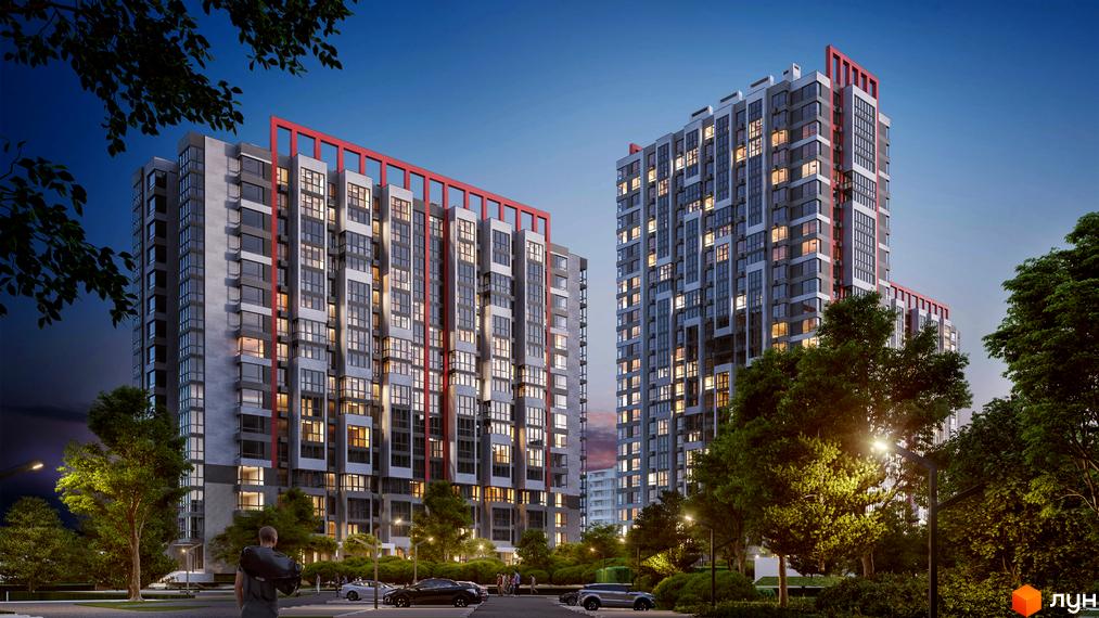 Високі будинки ЖК 7 KVARTAL з великою кількістю вікон, червоними вставками на фасаді та освітленою прибудинковою територією з деревами та автомобілями.